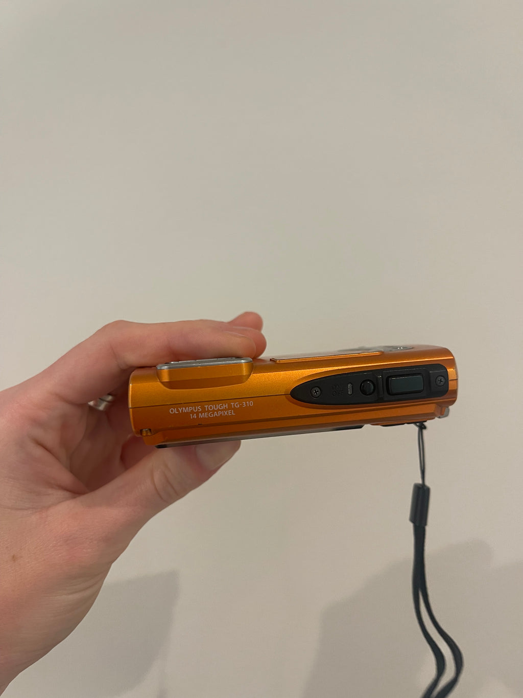 Orange Olympus Tough TG-310 digital camera