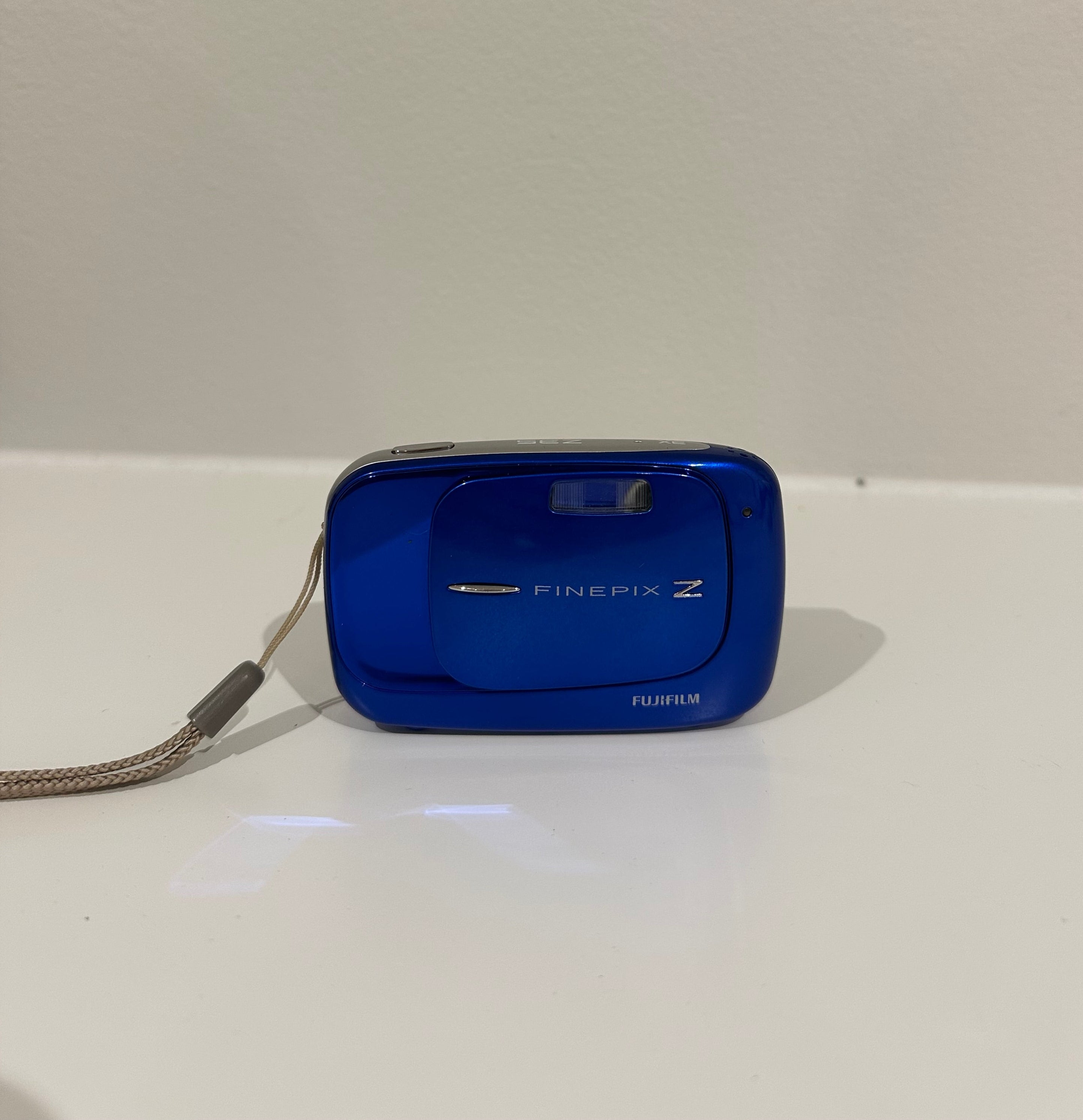 Blue Fujifilm FinePix Z35 digital camera