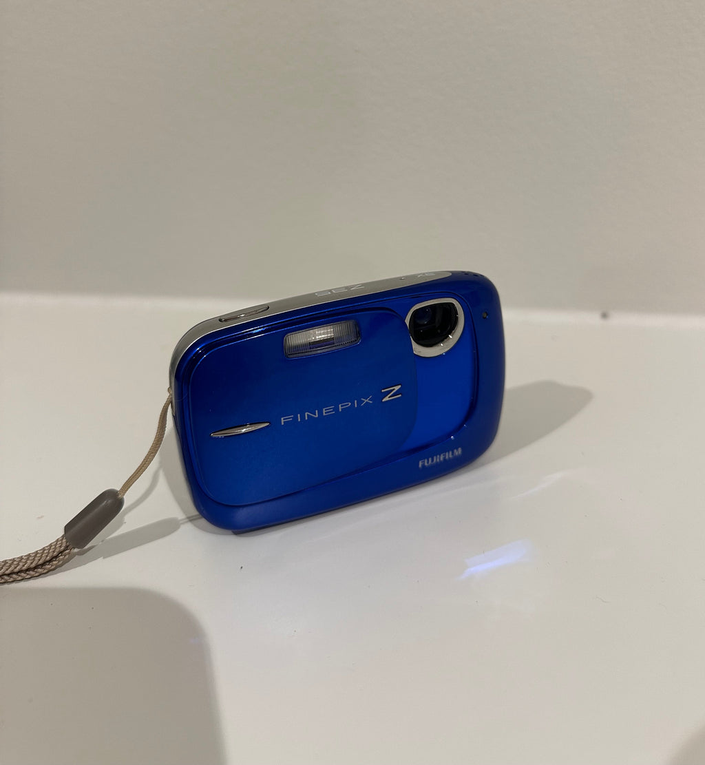 Blue Fujifilm FinePix Z35 digital camera