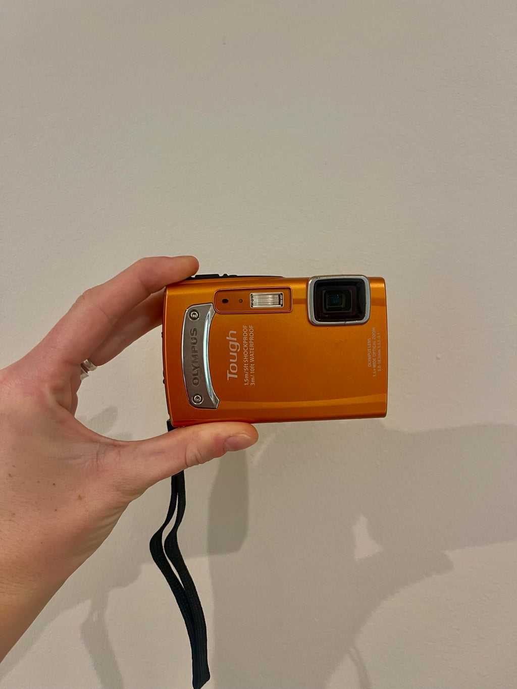 Orange Olympus Tough TG-310 digital camera