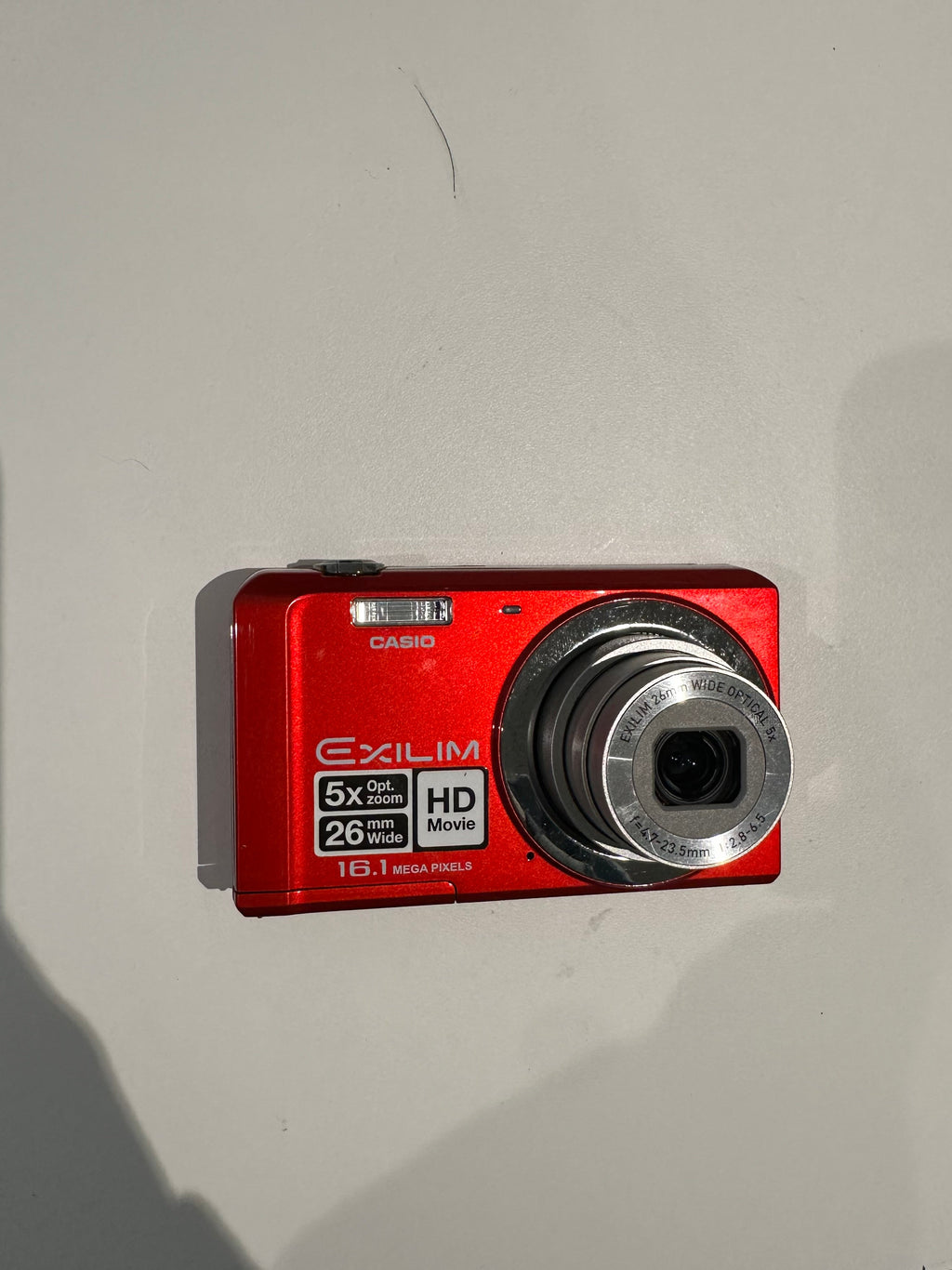 Red Casio Exilim EX-ZS6 digital camera