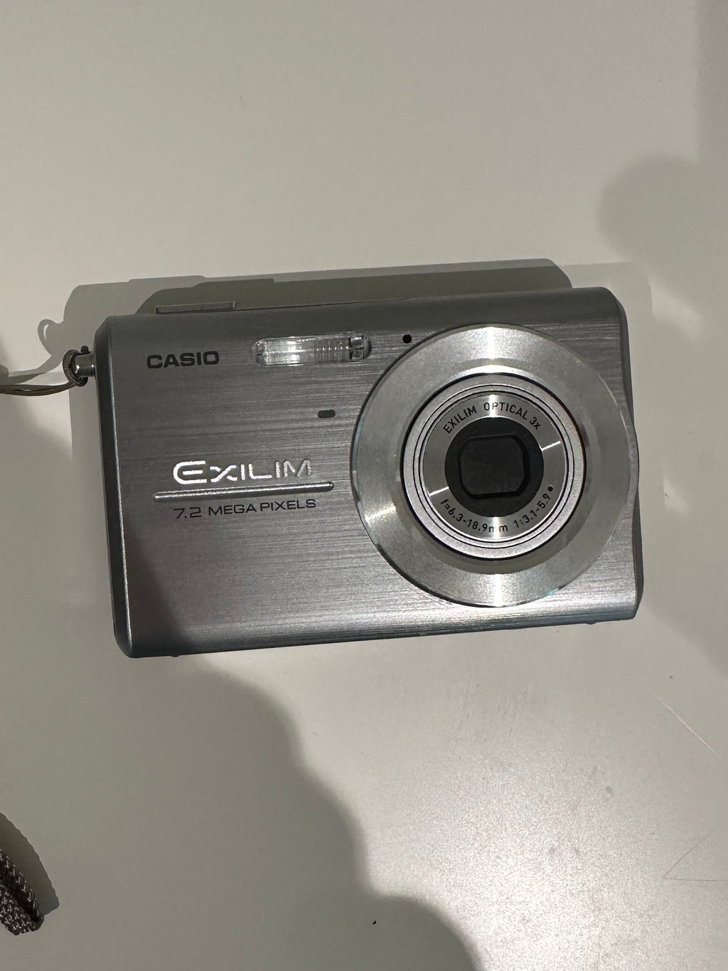 Silver Casio Exilim EX-Z75 digital camera