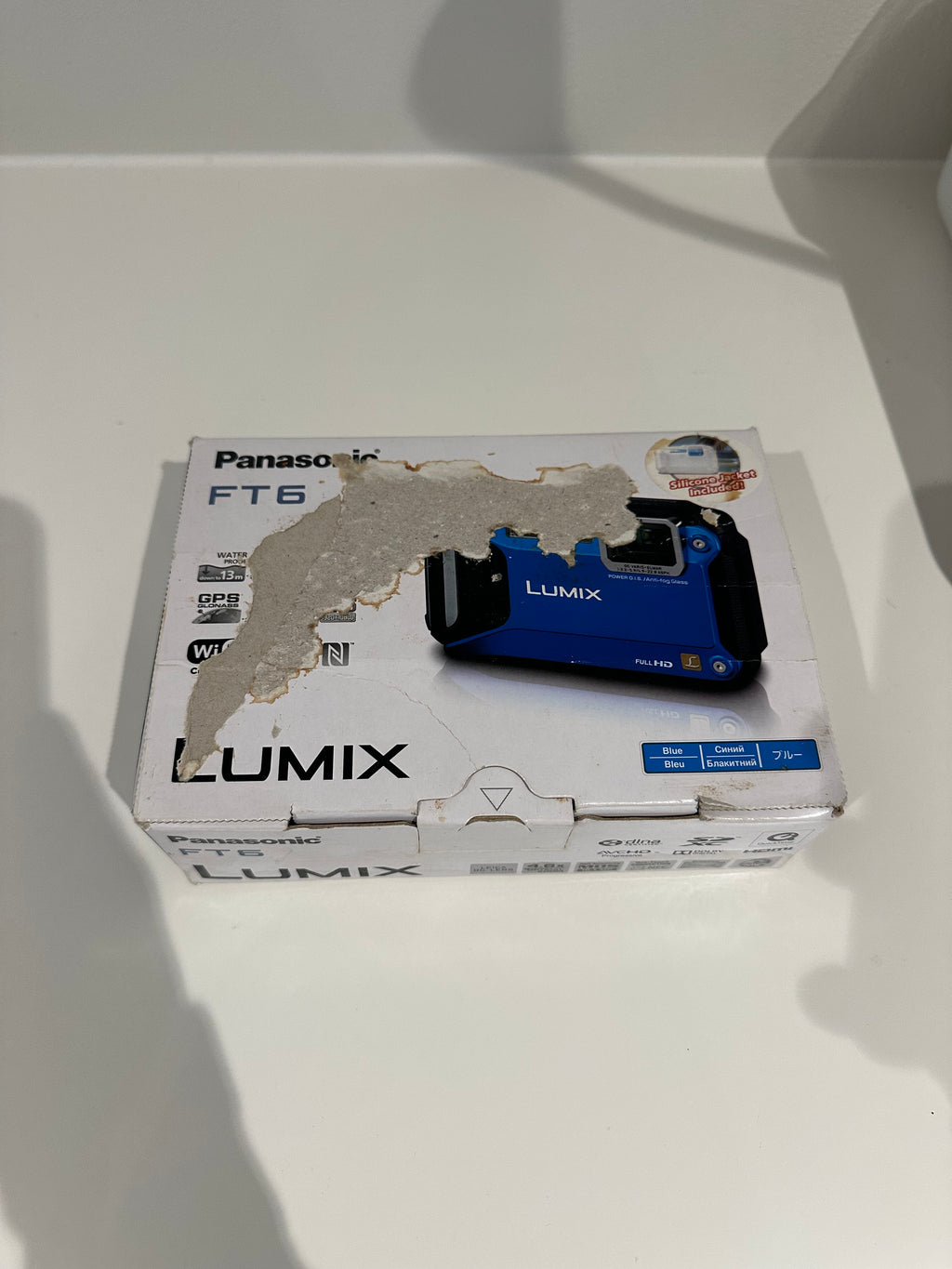 Blue Lumix DMC-FT6 digital camera
