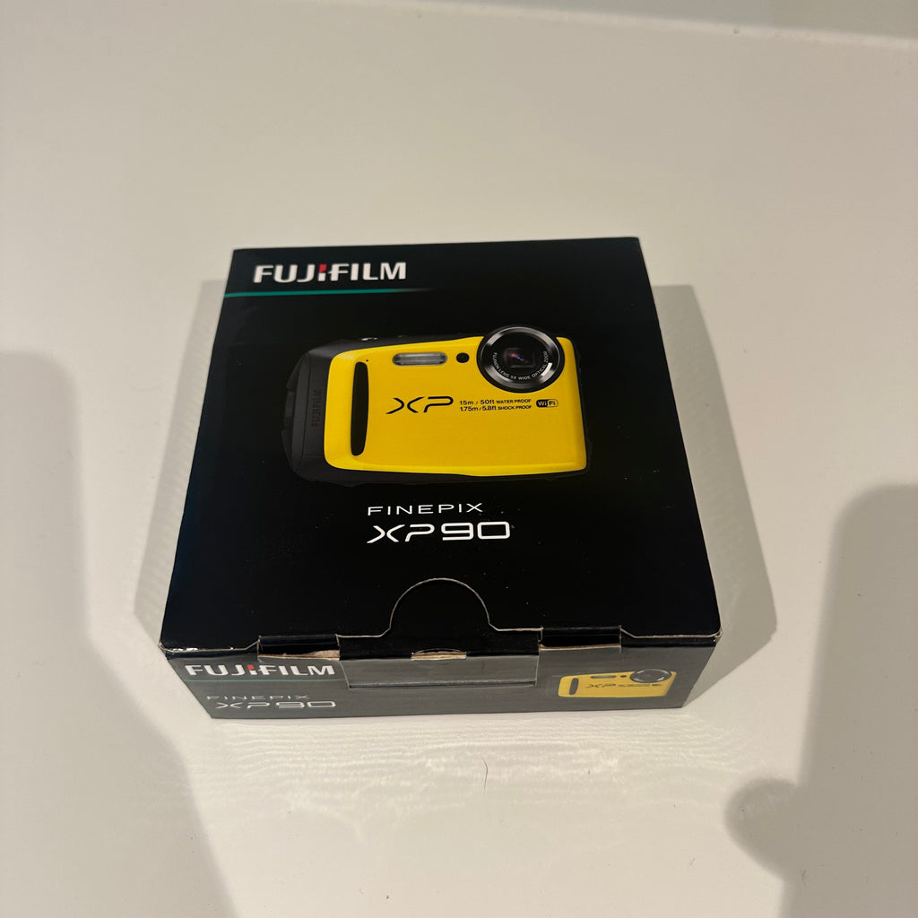 Yellow Fujifilm FinePix XP90 digital camera