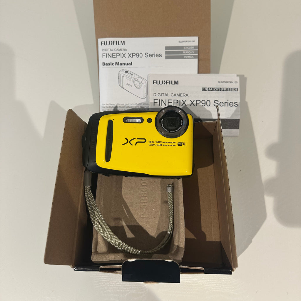Yellow Fujifilm FinePix XP90 digital camera