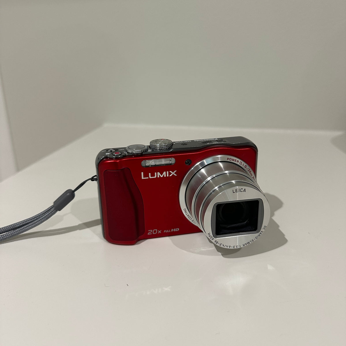 Red Lumix DMC-ZS20 digital camera